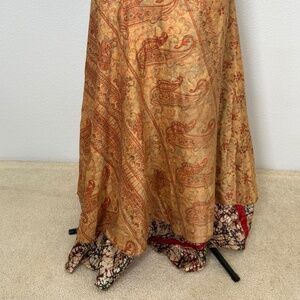 Reversible, dual-pattern Indian silk wrap skirt with red, black, and tan designs